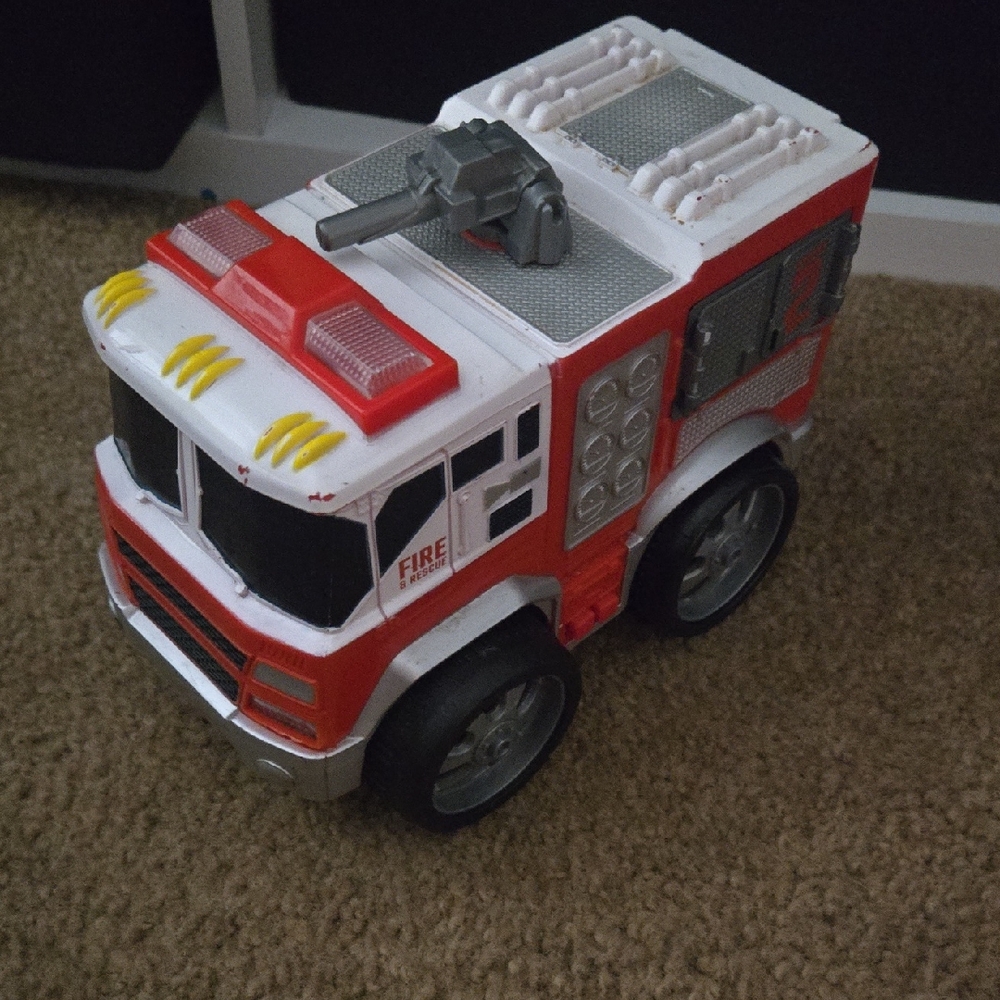 Red and White Fire Rescue Vehicle Toy